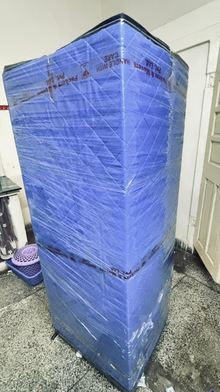 Quilted padded armor on refrigerator